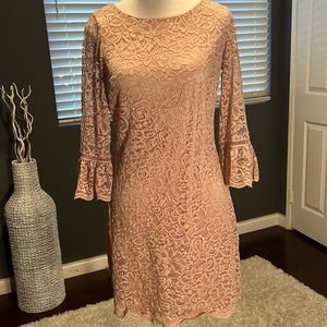 Pink stretch lace dress with lace 3/4 sleeves design.